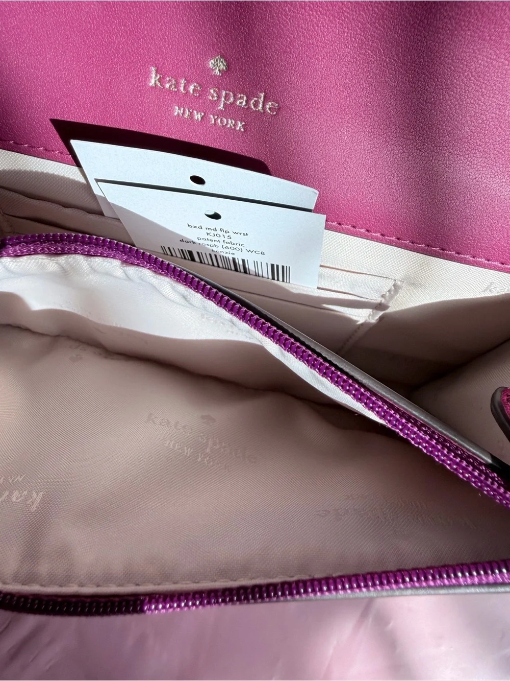 Kate Spade Glossy Magenta Patent Leather Clutch with metal logo plate